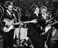 June 24, 1966. The Beatles perform live at Circus-Krone-Bau, Munich, Germany.
