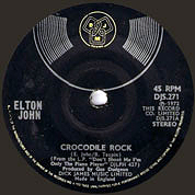 Crocodile Rock / Elderberry Wine, DJM UK, DJS 271, October 27, 1972, 7″45 RPM.