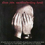 Sacrifice / Healing Hands, The Rocket Record Company UK, EJS 22, May 25, 1990, 7″45 RPM.